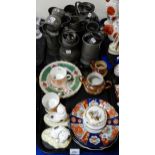 A collection of pewter tankards and measures, a pair of George V and Queen Mary coronation mugs,