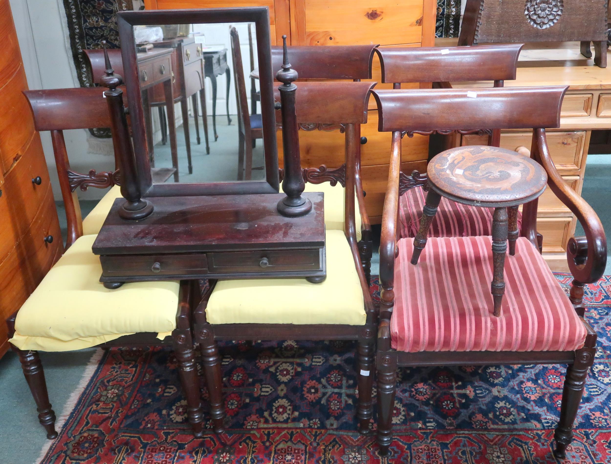 A lot comprising mahogany sabre legged dining chairs, a circular topped pokerwork stool and a 19th