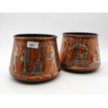 A pair of silver overlaid copper planters in Egyptian theme Condition Report:Available upon request