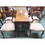 A set of four Victorian walnut framed balloon back parlour chairs on cabriole supports and a