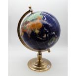 A large blue ground hardstone globe of the world on gilt metal stand Condition Report:Available upon