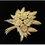 A floral spray brooch by Christian Dior, dimensions 10cm x 8cm, signed verso Condition Report:No
