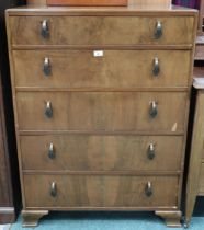 An early 20th century walnut veneered five drawer chest, 115cm high x 85cm wide x 49cm deep