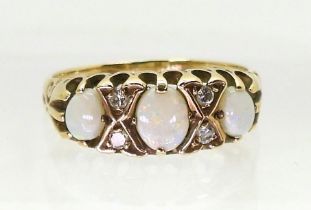 A 9ct gold opal and diamond ring, finger size J1/2, weight 1.6gms Condition Report:Available upon