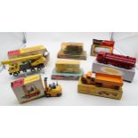 Boxed/packaged Dinky Toys of mixed age, comprising 409 Articulated Lorry, 404 Conveyancer Fork