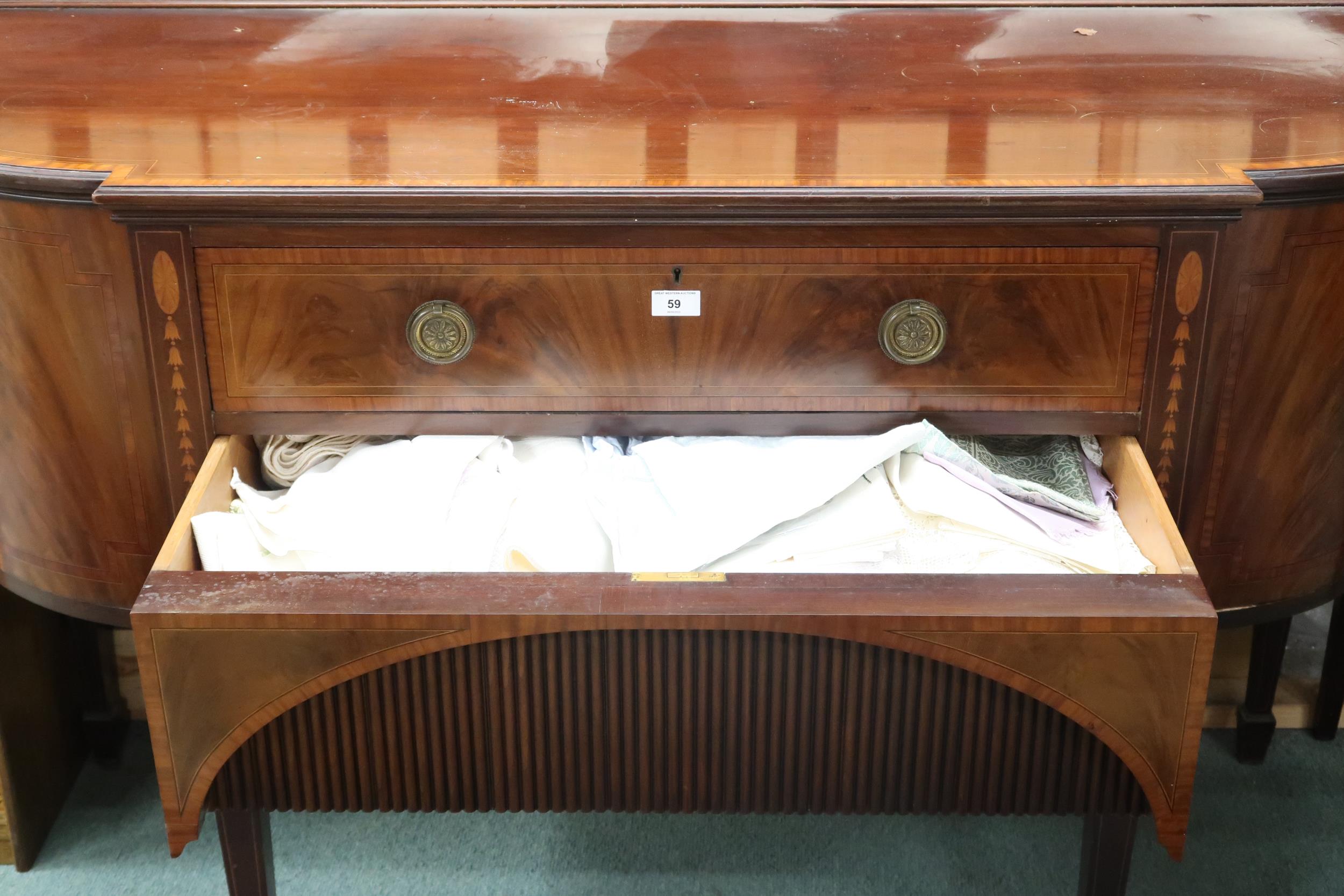 A 19th century mahogany sideboard with central long drawers flanked by bowed cabinet doors on square - Image 2 of 3