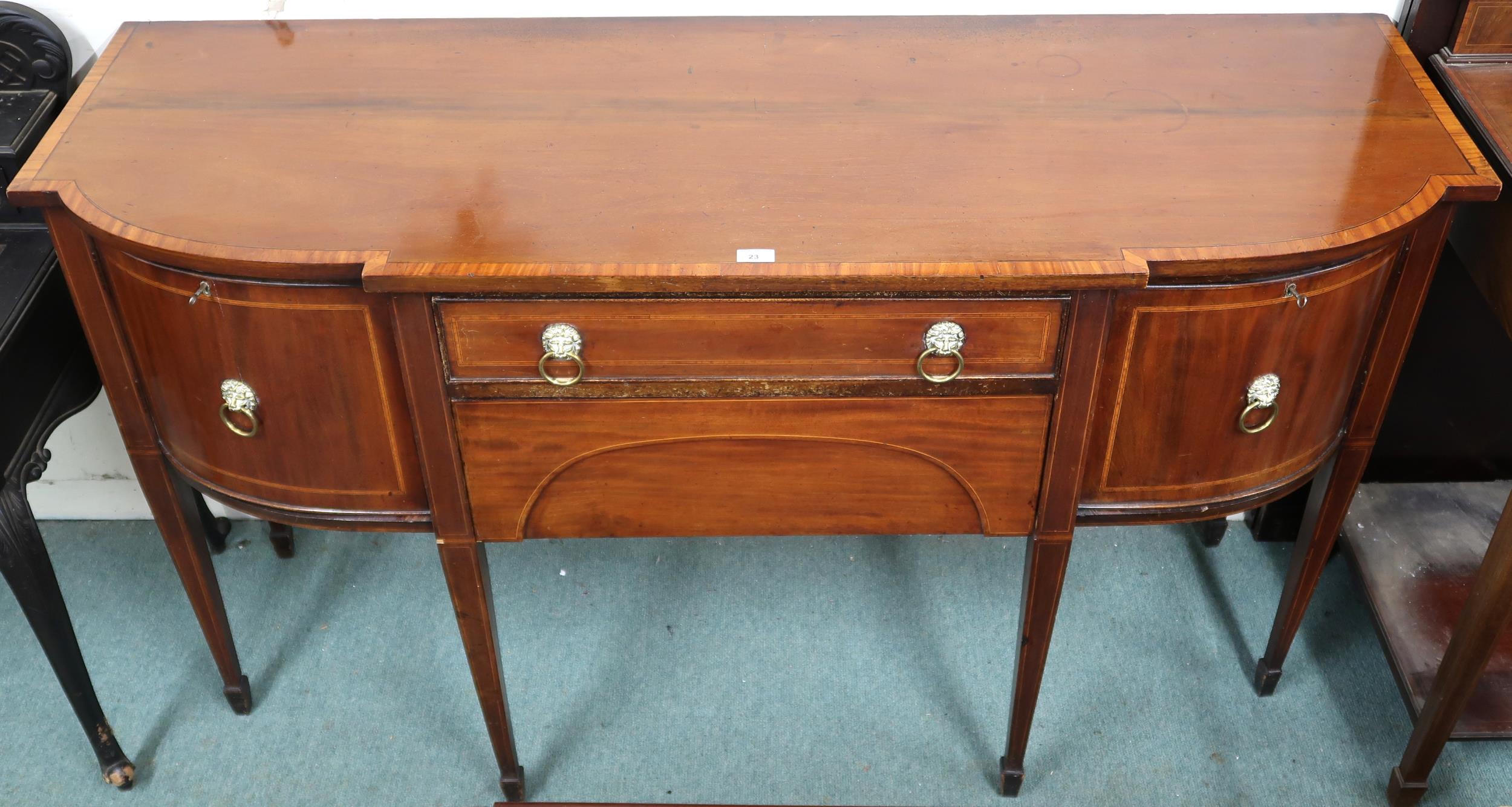 A 19th century mahogany sideboard with two central drawers flanked by bowed cabinet doors on - Image 2 of 3