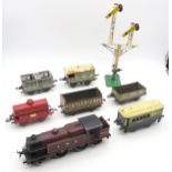 A Meccano Hornby 0-gauge electric train set, comprising a 4-4-2 locomotive in maroon LMS livery,