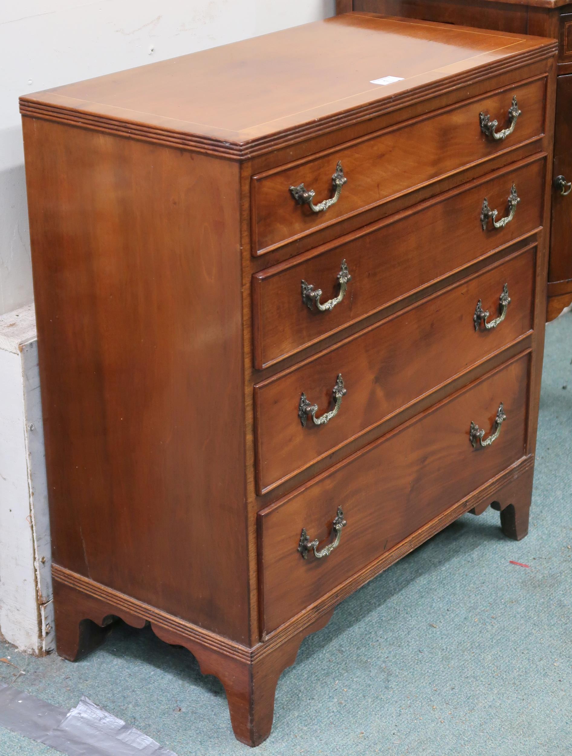 A 19th century mahogany chest of drawers with four graduating drawers with cast brass drawer pulls - Image 2 of 2