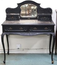 A 19th century continental style ebonised desk with shaped superstructure of central bevelled