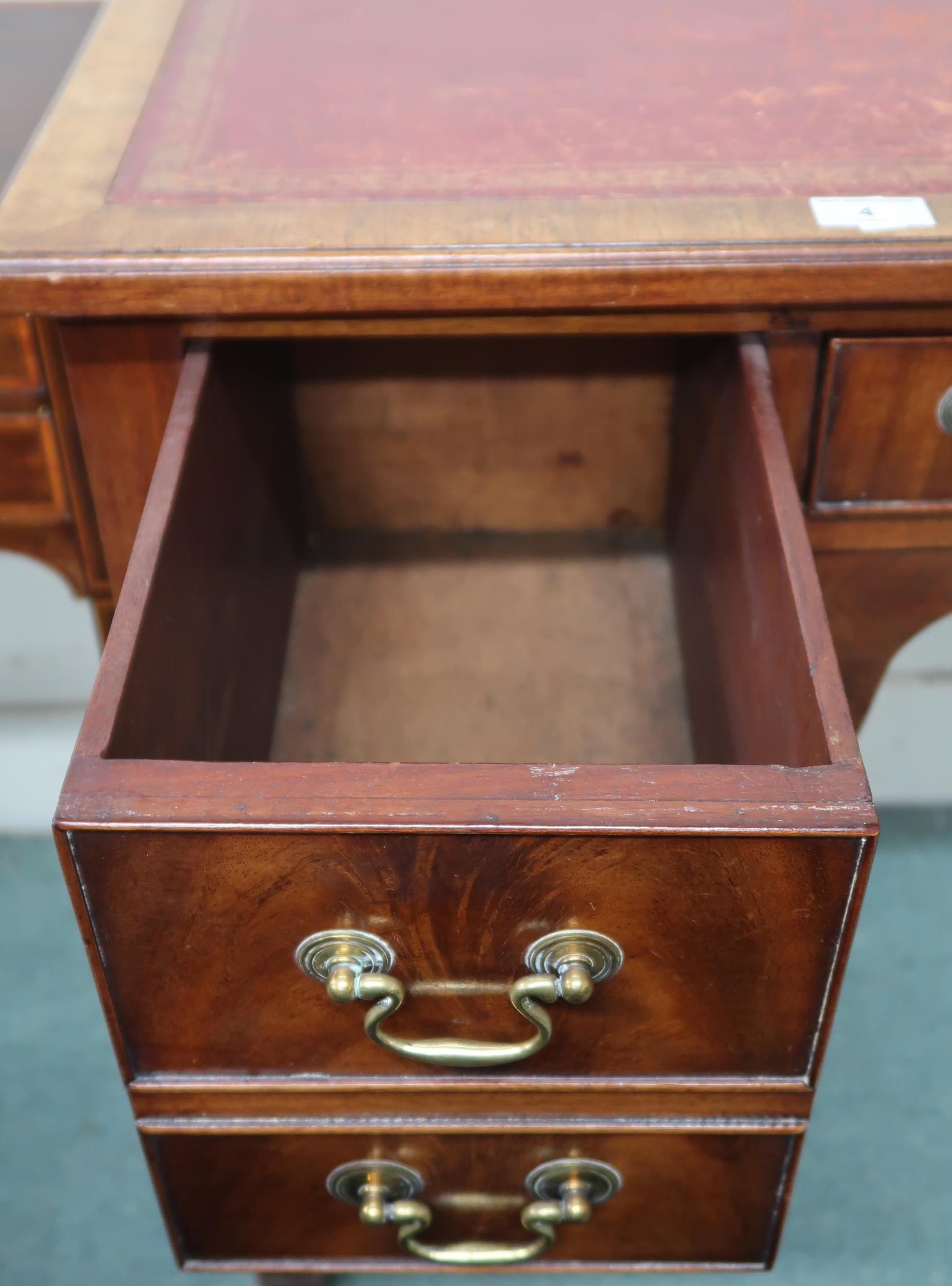 A 19th century mahogany low boy style desk with red skiver over central drawer flanked by two - Image 2 of 2