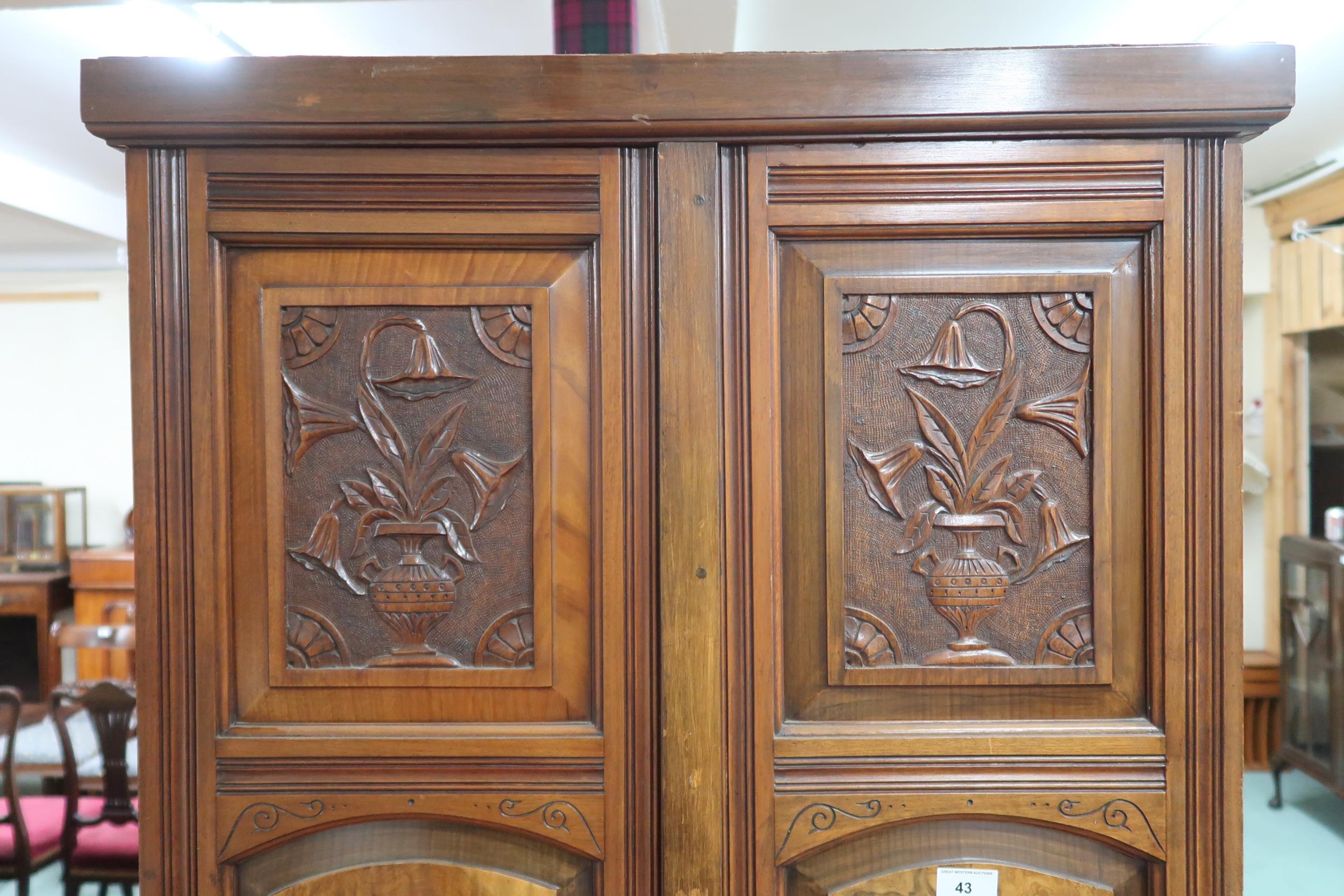 A Victorian mahogany and burr walnut veneered hall robe with two panel doors over two long drawers - Image 2 of 5