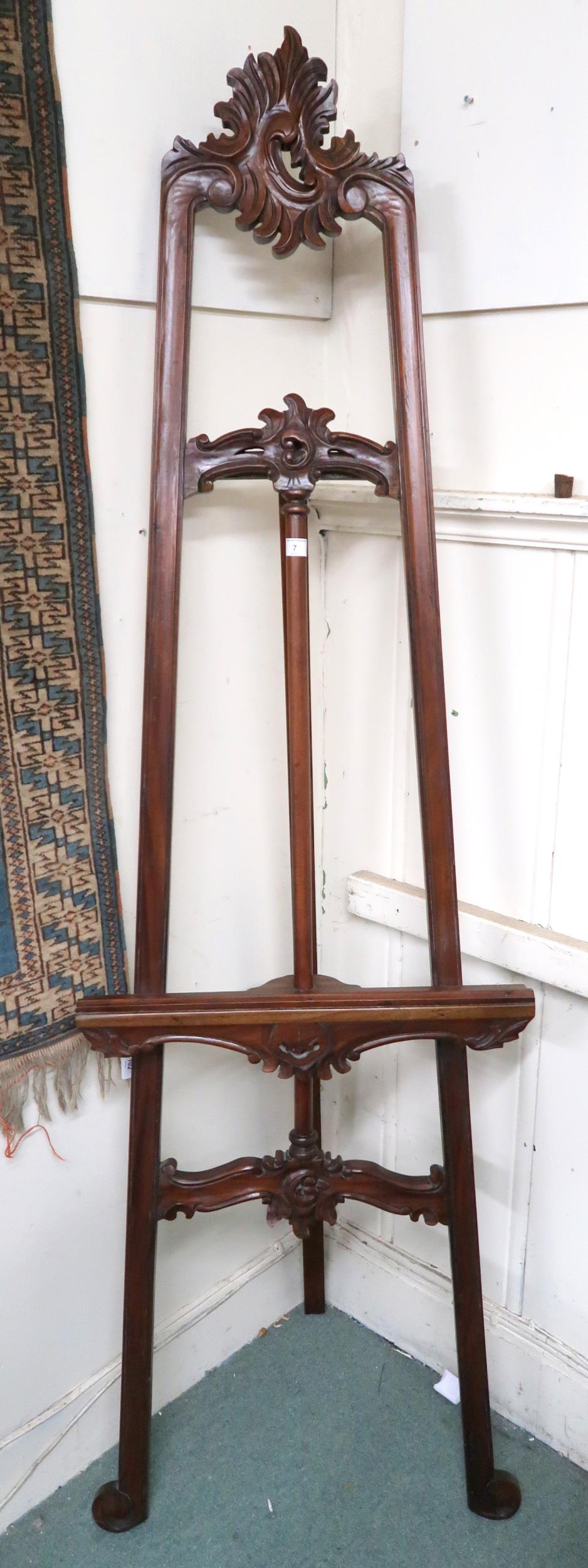 A 20th century carved hardwood folding easel, 197cm high x 59cm wide Condition Report:Available upon