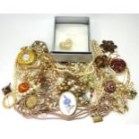 A heart shaped Christian Dior brooch in original box,  silver and amber brooch, and pendant and a