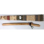 A First Nation pentatonic wooden flute. This instrument is from the collection of Jimmie MacGregor