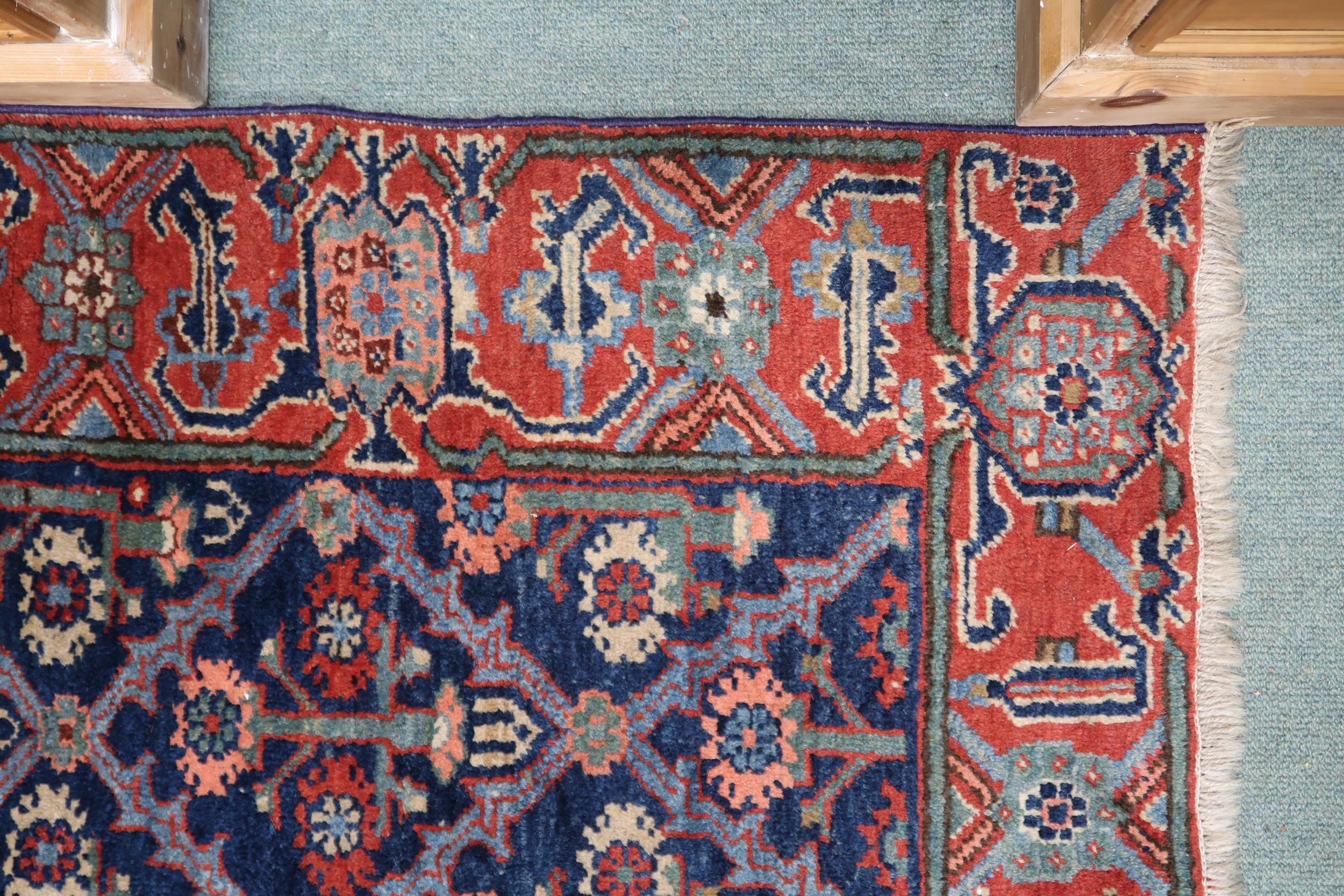 A blue ground Kurdish tribal runner with all-over floral pattern ground and pink geometric border, - Image 2 of 3