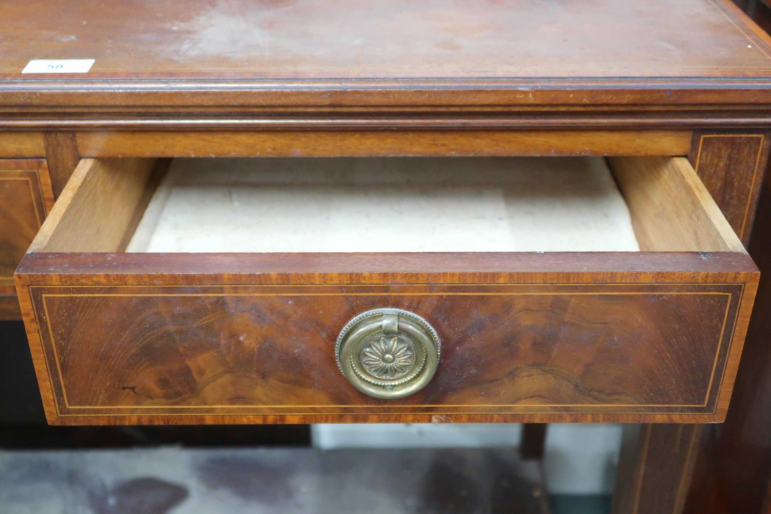 A late Victorian mahogany buffet table with two drawers on square tapering supports joined by - Image 3 of 3