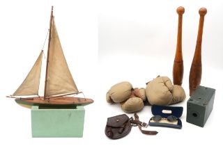 A pond yacht by Glasgow Model Dockyard, Argyll Arcade, two pairs of canvas and leather boxing