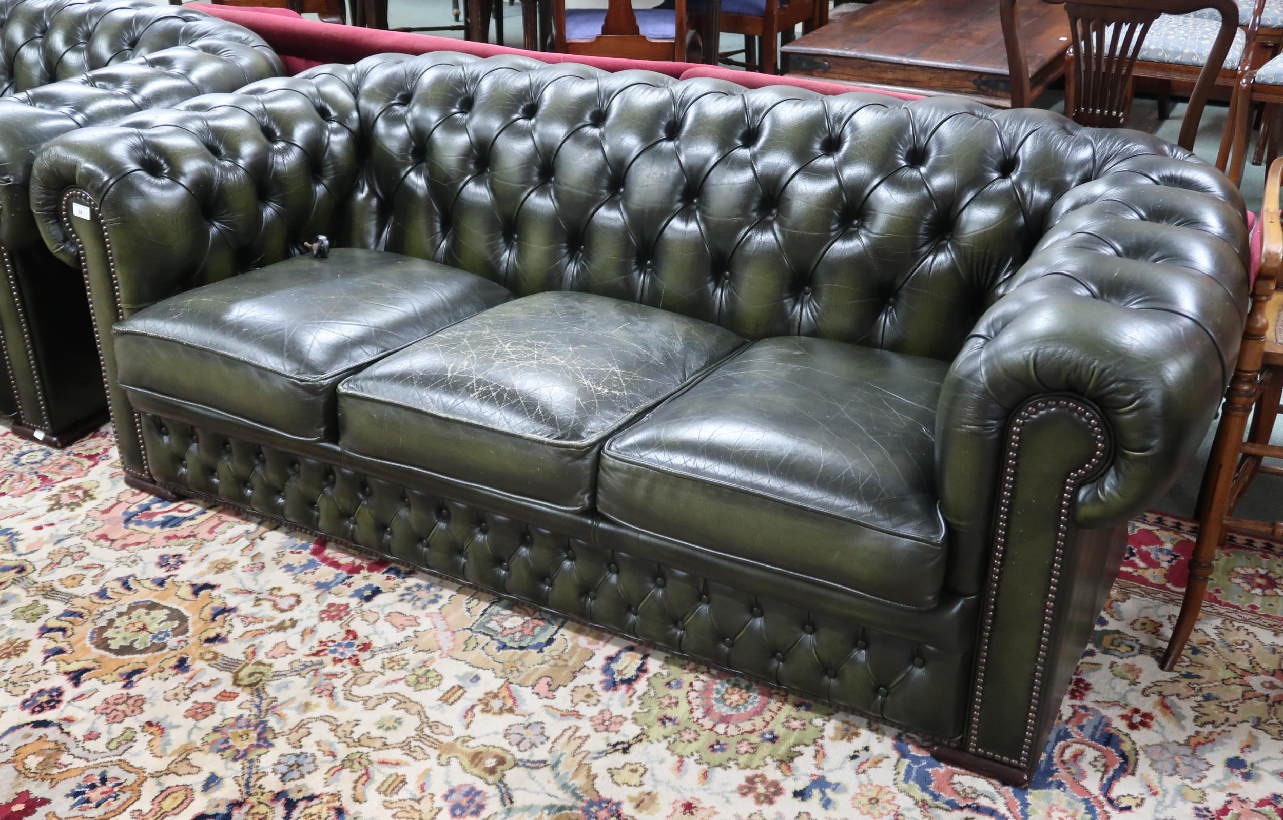 A 20th century forest green leather buttonback upholstered Chesterfield style three seater club - Image 2 of 2