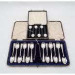 A cased set of silver Old English pattern tea spoons and sugar tongs, maker's mark NS, engraved with