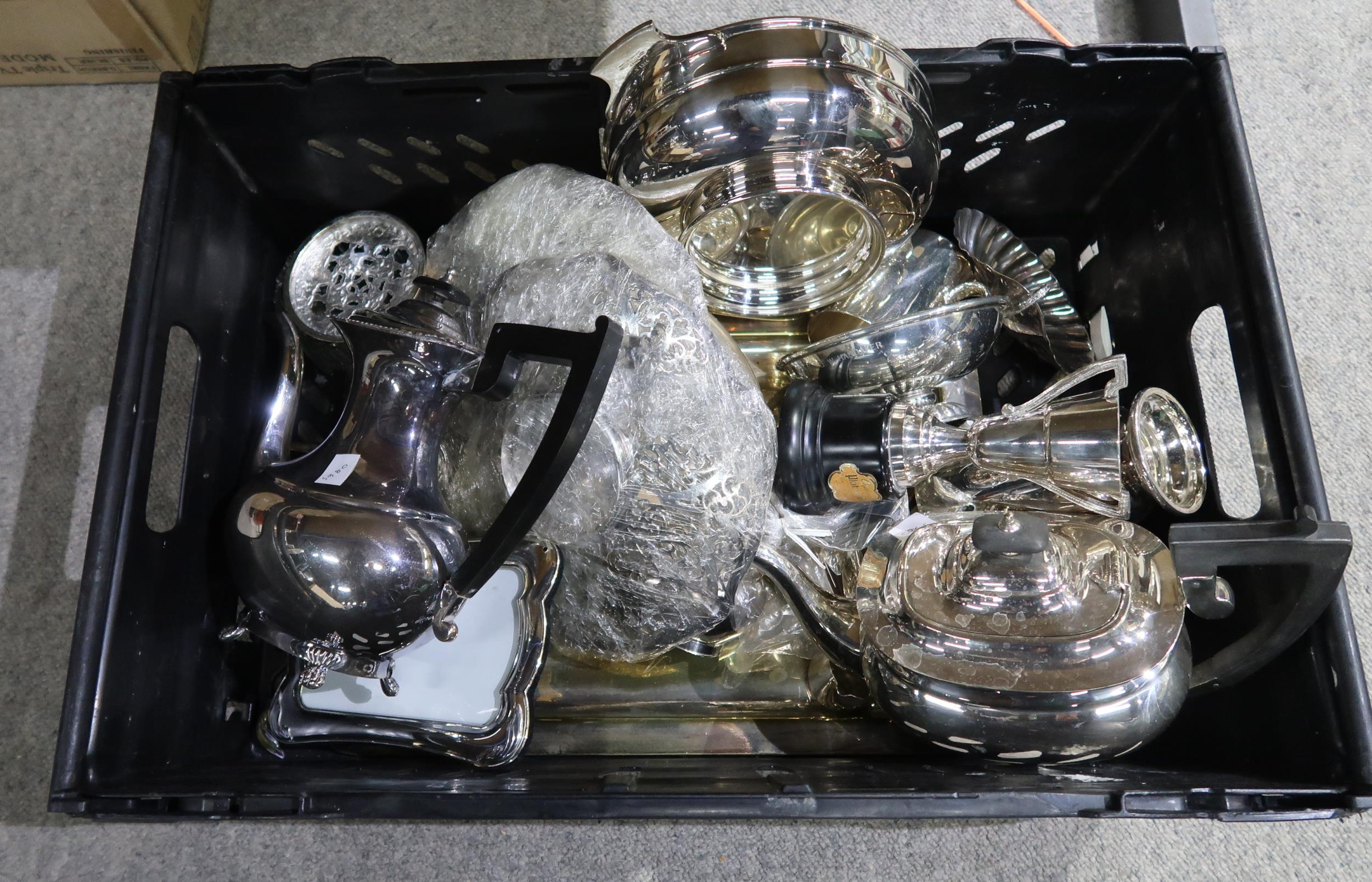 A collection of EPNS including tea sets, a large quaich, photo frames, dishes, trophy cups, tray etc