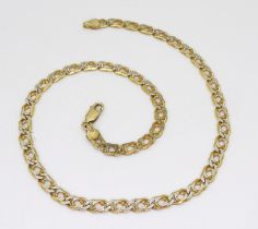 A 9Kt fancy curb chain necklace with white gold details, length 36cm, weight 11gms Condition