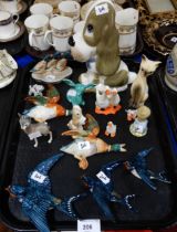 A set of three Beswick Swallow wall plaques, other Beswick figures including Babycham faun, Wade I'