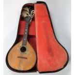MANDOLIN a 16 fret flat back mandolin  Condition Report:Available upon request