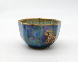 A small Wedgwood lustre octagonal bowl decorated with a dragon and fo dogs, number Z4829 Condition