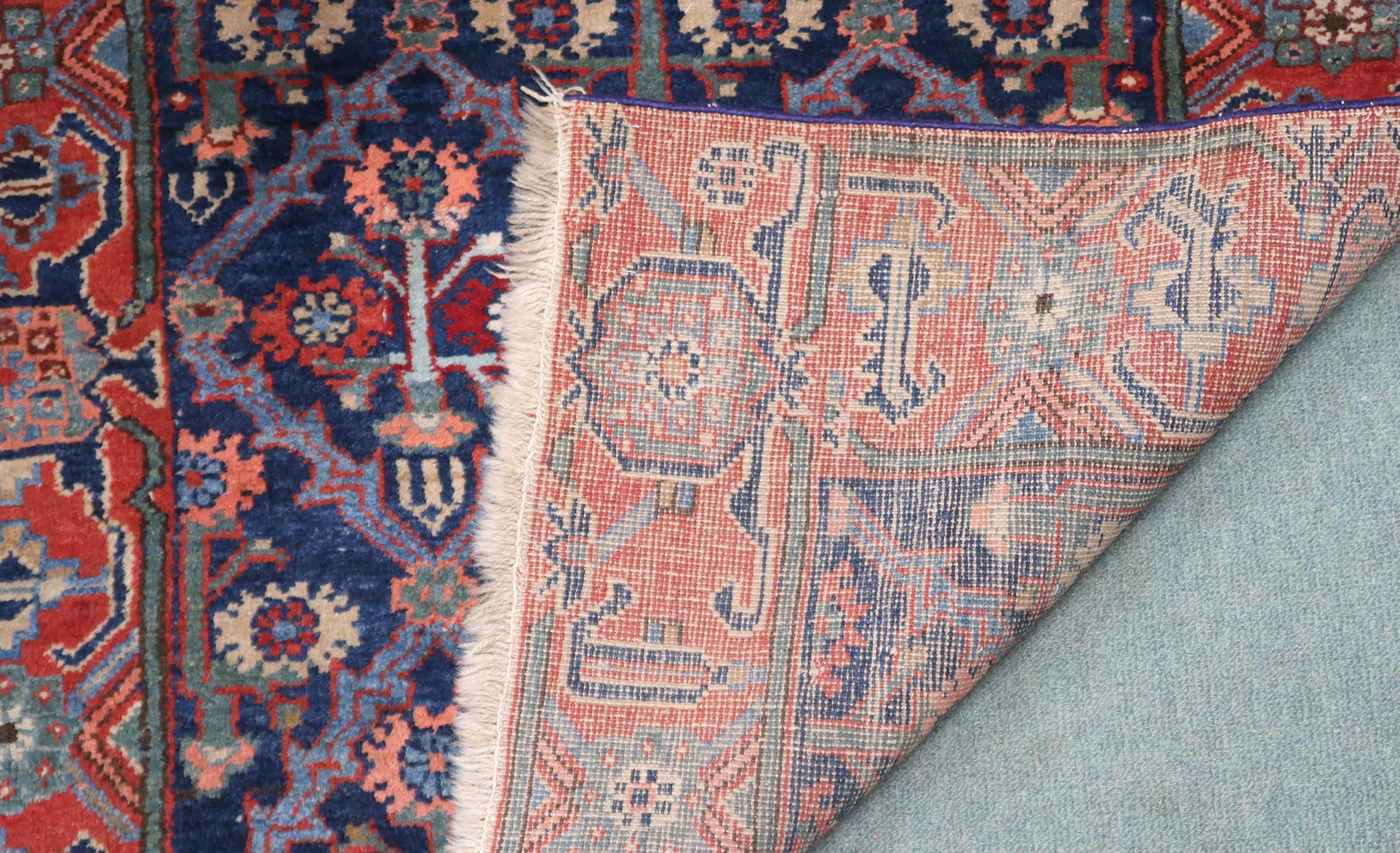 A blue ground Kurdish tribal runner with all-over floral pattern ground and pink geometric border, - Image 3 of 3