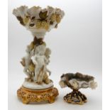 A Moore' pottery cherub centrepiece together with a small bowl Condition Report:Available upon