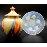 An Etling opaline glass bowl with flower feet, together with a Falcon Ware jar and cover Condition