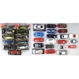 Various boxed 1:18 scale die-cast model vehicles by Maisto, to include a Jaguar XK8, XKR (1998)