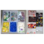 Lego: a very large quantity of loose Lego pieces, including many of the Technics type, sorted by