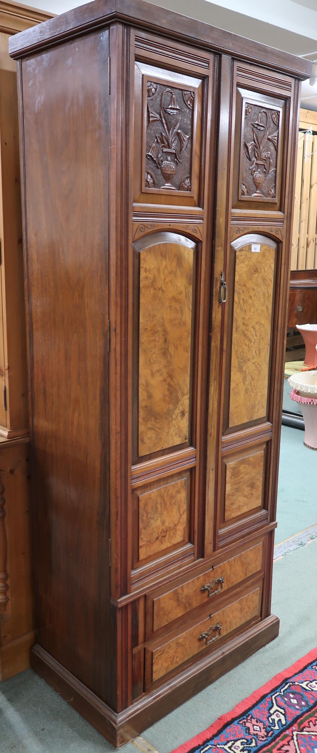 A Victorian mahogany and burr walnut veneered hall robe with two panel doors over two long drawers - Image 4 of 5