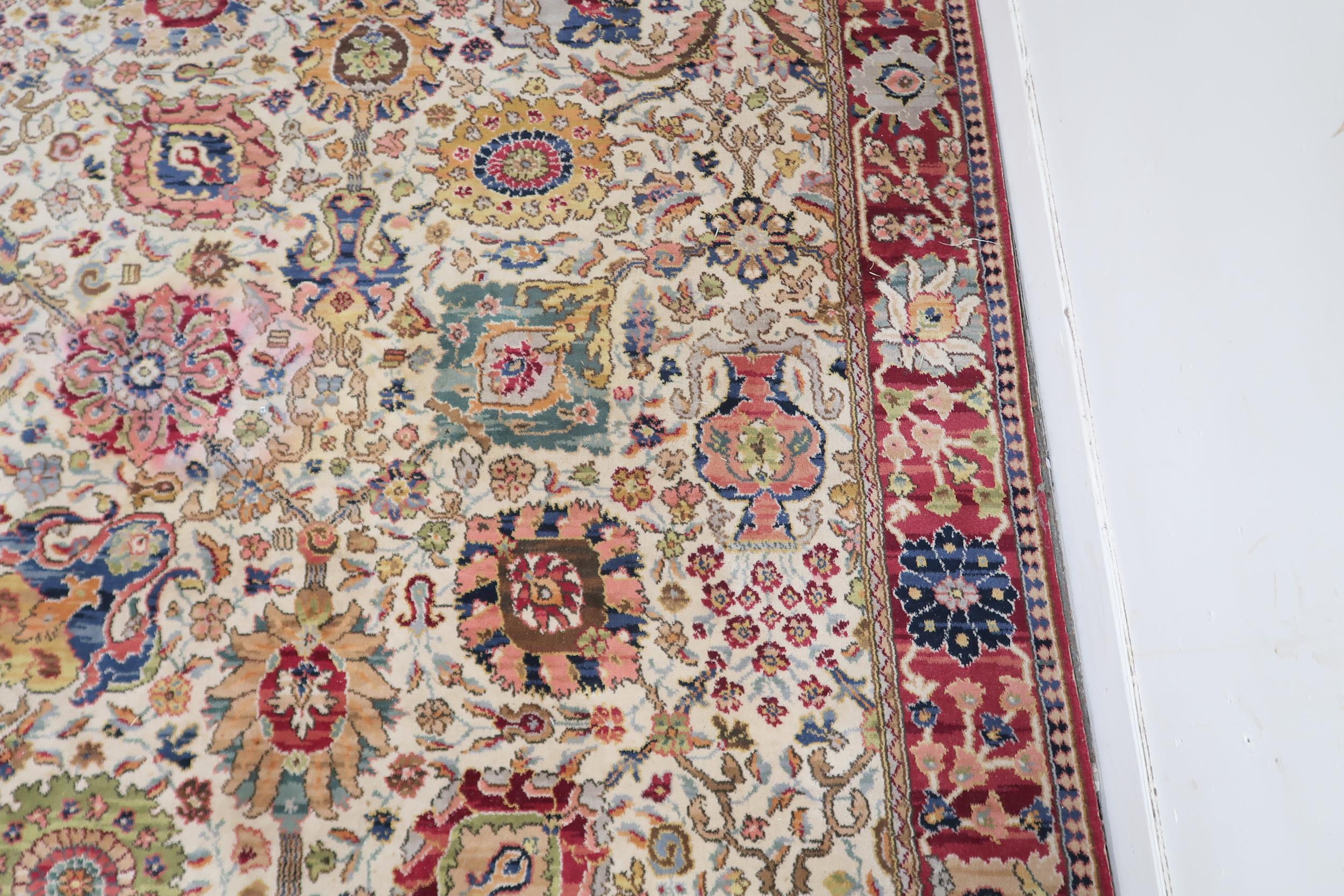 A cream ground James Templeton & Co Ltd carpet with all over floral patterned ground and red - Image 4 of 8