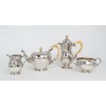 A MATCHED GEORGE V HEAVY GAUGE FOUR PIECE SILVER TEA SERVICE By Adie Brothers Ltd, London 1927,