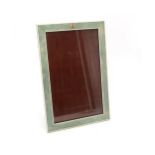 AN EARLY-20th CENTURY SHAGREEN AND IVORY-BANDED EASEL PHOTOGRAPH FRAME Measuring approx. 44.7cm x