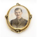 AN EARLY-20TH CENTURY PORTRAIT MINIATURE The subject, a young man in military uniform, sporting a