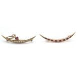 TWO CRESCENT MOON BROOCHES a bright yellow metal pearl and ruby set example, with galleried mount,