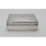 A CHINESE EXPORT SILVER CIGAR BOX by Wang Hing, of rectangular form, the lid monogrammed 'TB',