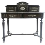 A CONTINENTAL EBONISED AND BONE INLAID WRITING DESK  with four drawer superstructure over inlaid