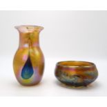 JOHN DITCHFIELD FOR GLASFORM  An amber coloured glass vase with blue teardrop decoration and pink