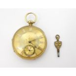 AN OPEN FACE POCKET WATCH made in 18ct gold, the case with all over foliate engraving, has Chester