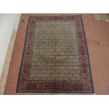 A MULTICOLOURED PATTERNED GROUND TABRIZ RUG  with red patterned border, 304cm long x 214cm wide