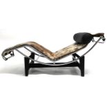 A 20TH CENTURY AFTER LE CORBUSIER TYPE LC4 CHAISE LONGUE  with black leather head cushion and faux