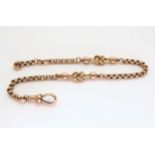 A VINTAGE LOVERS KNOT BRACELET with 9ct gold soldered on tag to the end of the chain and to the