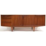 A MID 20TH CENTURY TEAK MCINTOSH SIDEBOARD  with pair of central cabinet doors flanked by three