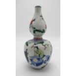 A CHINESE WUCAI DOUBLE GOURD VASE the body decorated with two scholars playing a game of Go, the