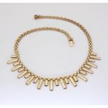 A 9CT RETRO FRINGE NECKLET bears London hallmarks for 1994. Length 41cm, weight 18.2gms Condition
